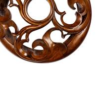 A Pair of Carved Oak Roundels