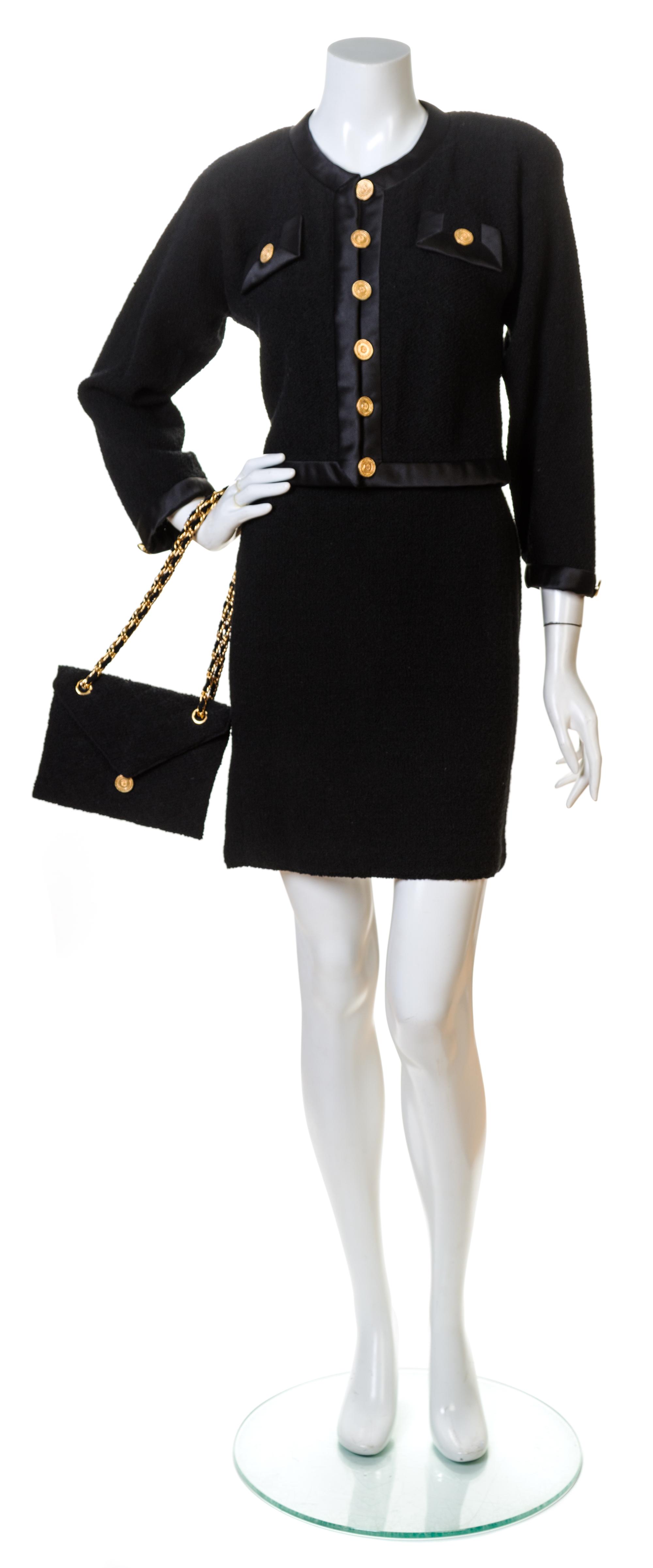 An Adolfo Black Knit Skirt Ensemble, No size. Handbag: 8'' x 6.5''; Strap drop: 10''.