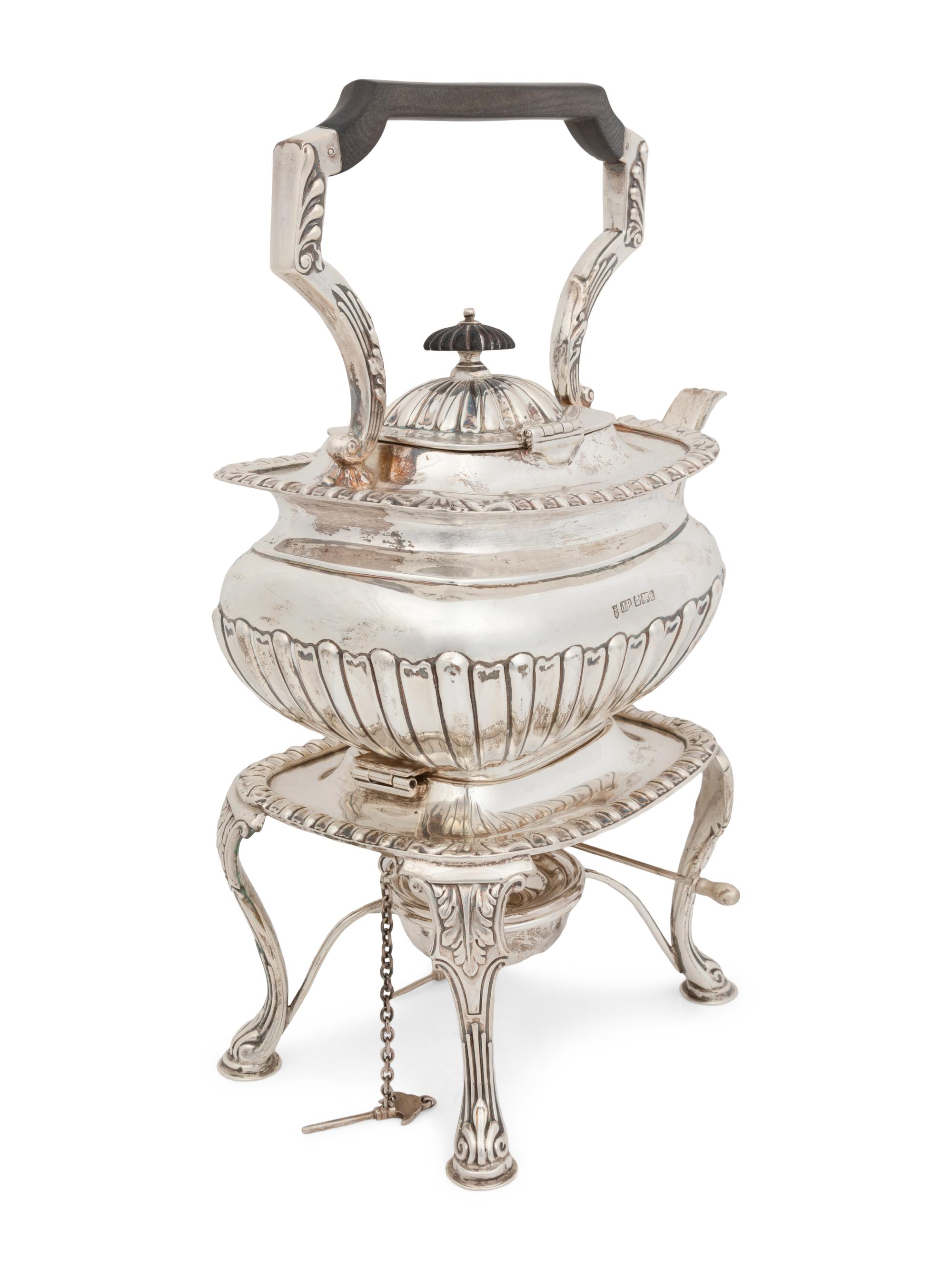 An Edwardian Silver Teapot on Stand