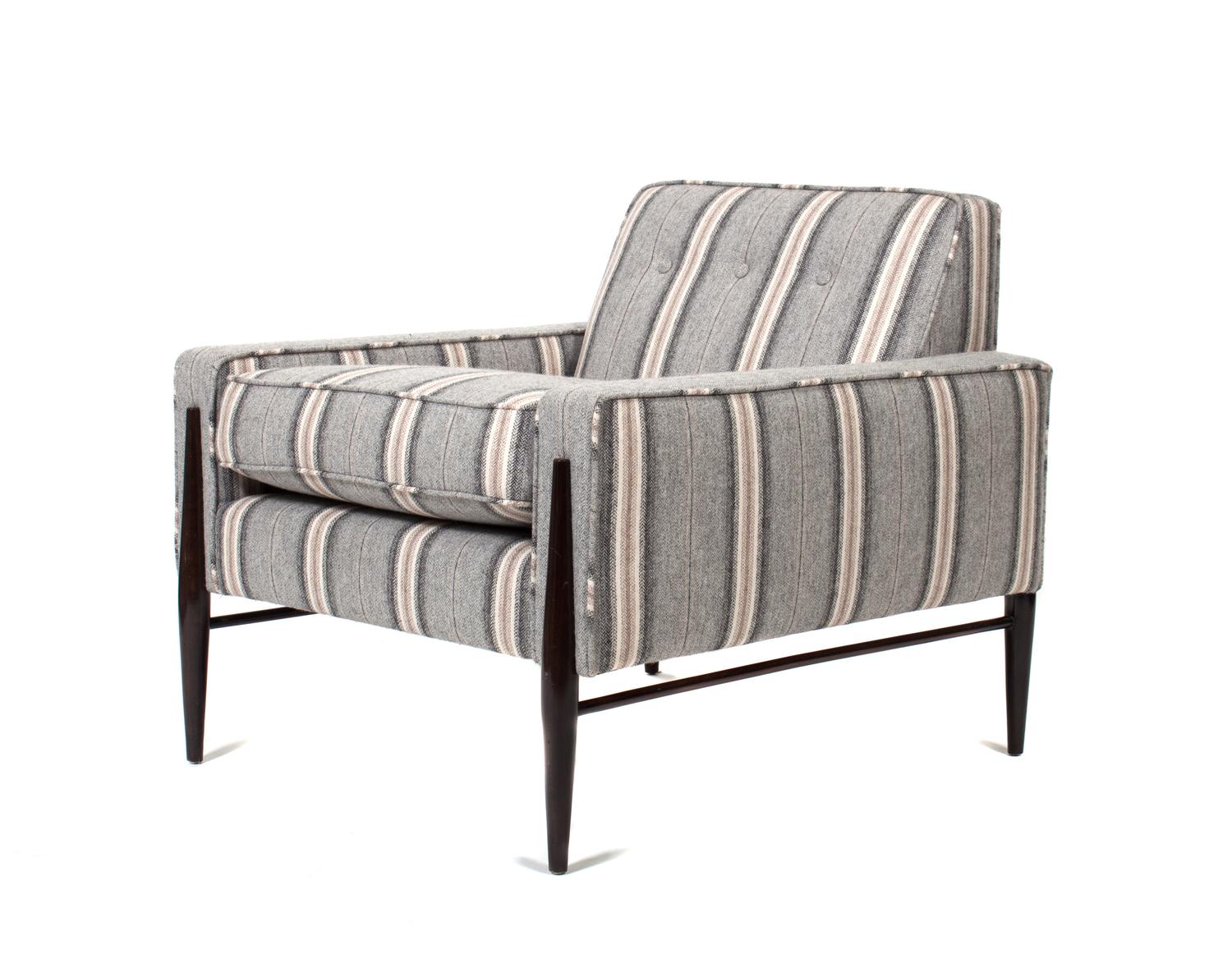An Upholstered Armchair Height 27 1/2 inches. — 20TH CENTURY