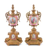 A Pair of Sèvres Style Gilt Metal Mounted Painted Porcelain Ornaments