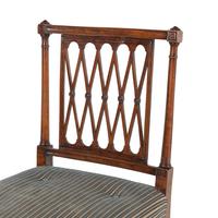 A Set of Eight George III Mahogany Lattice-Back Dining Chairs