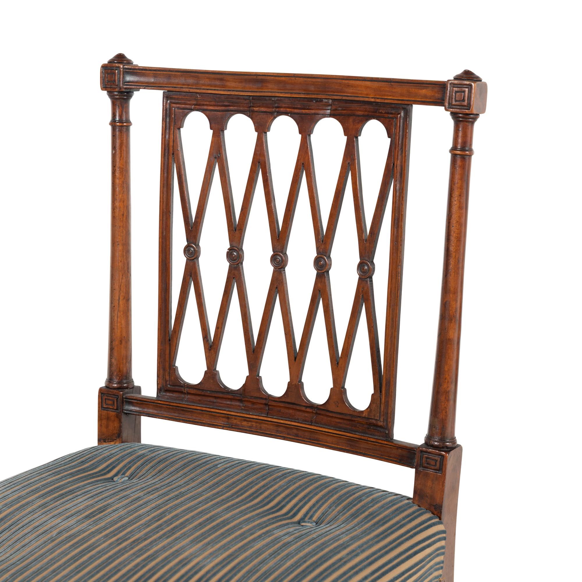 A Set of Eight George III Mahogany Lattice-Back Dining Chairs