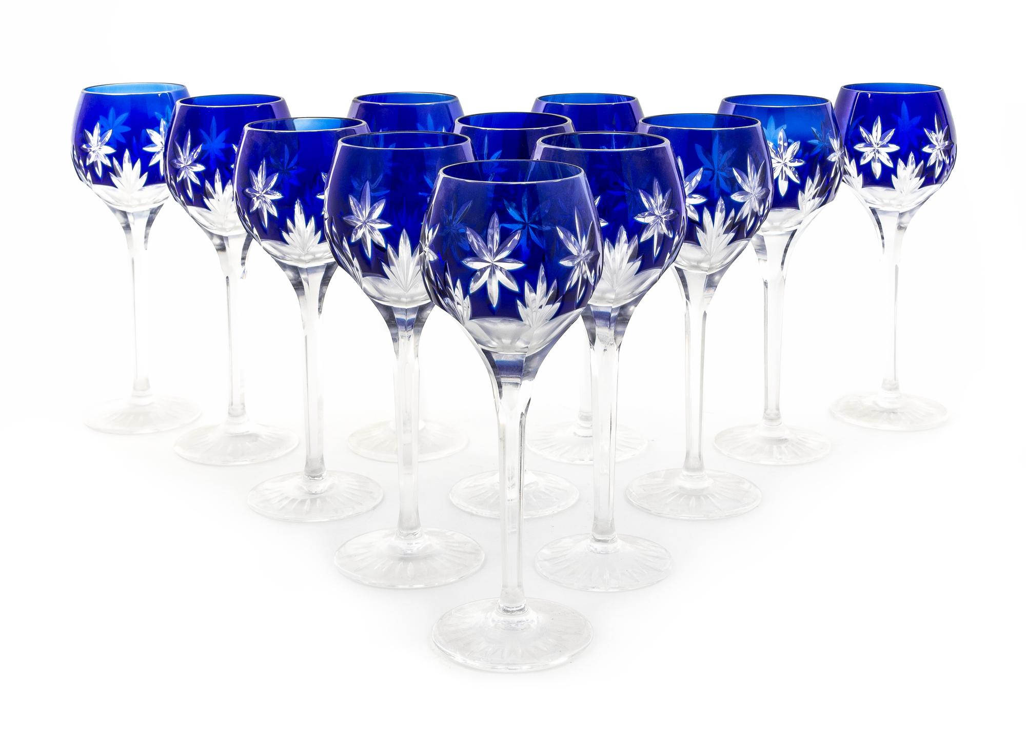 A Set of Twelve Cobalt Cut to Clear Glass Wine Stems Height 8 1/4 inches.