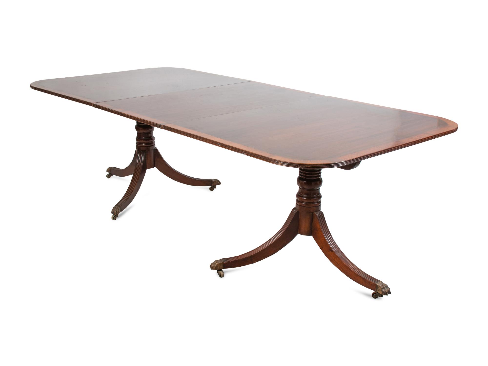 A Regency Style Mahogany Double-Pedestal Dining Table