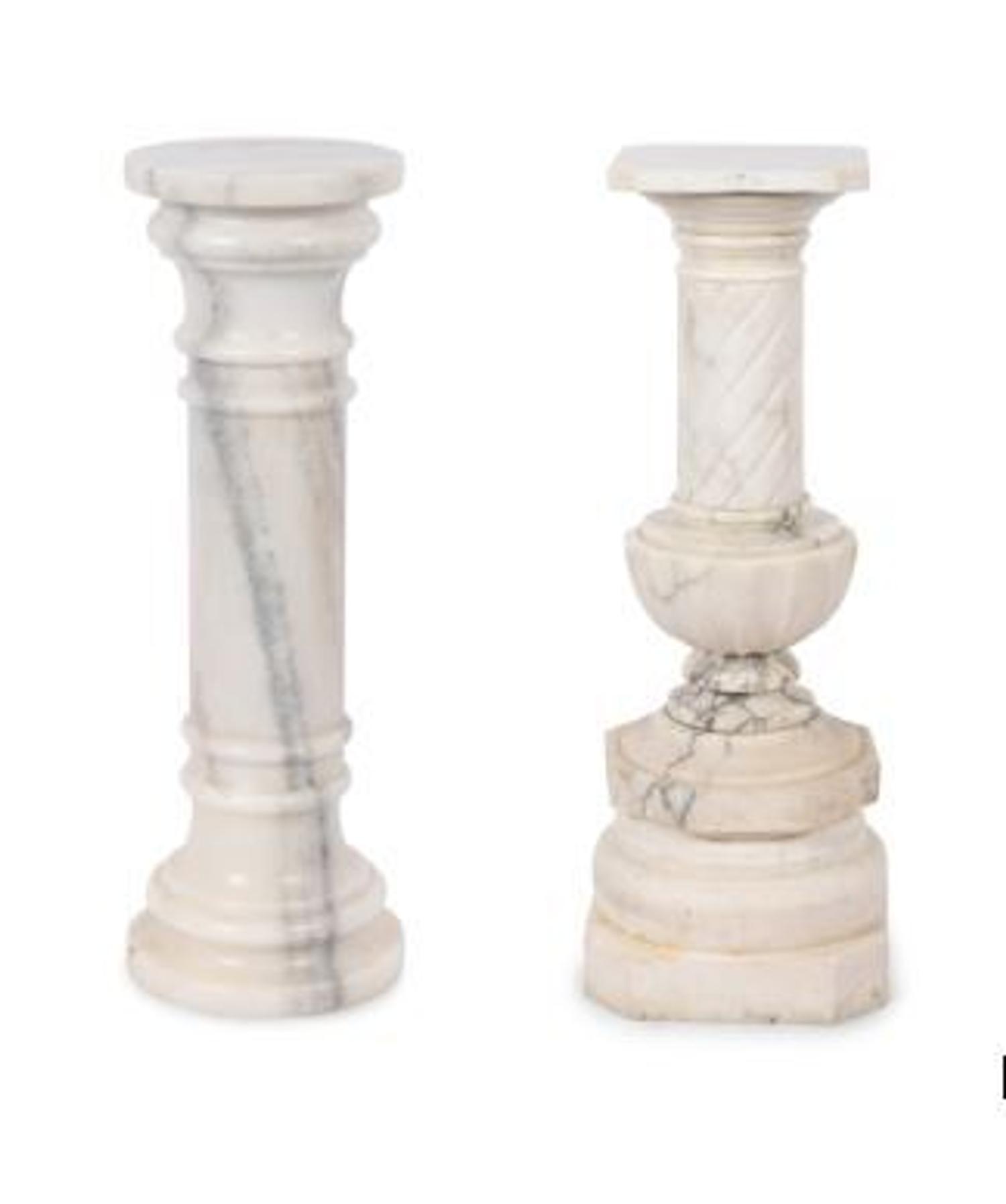 A Pair of Continental Carved Marble Pedestals