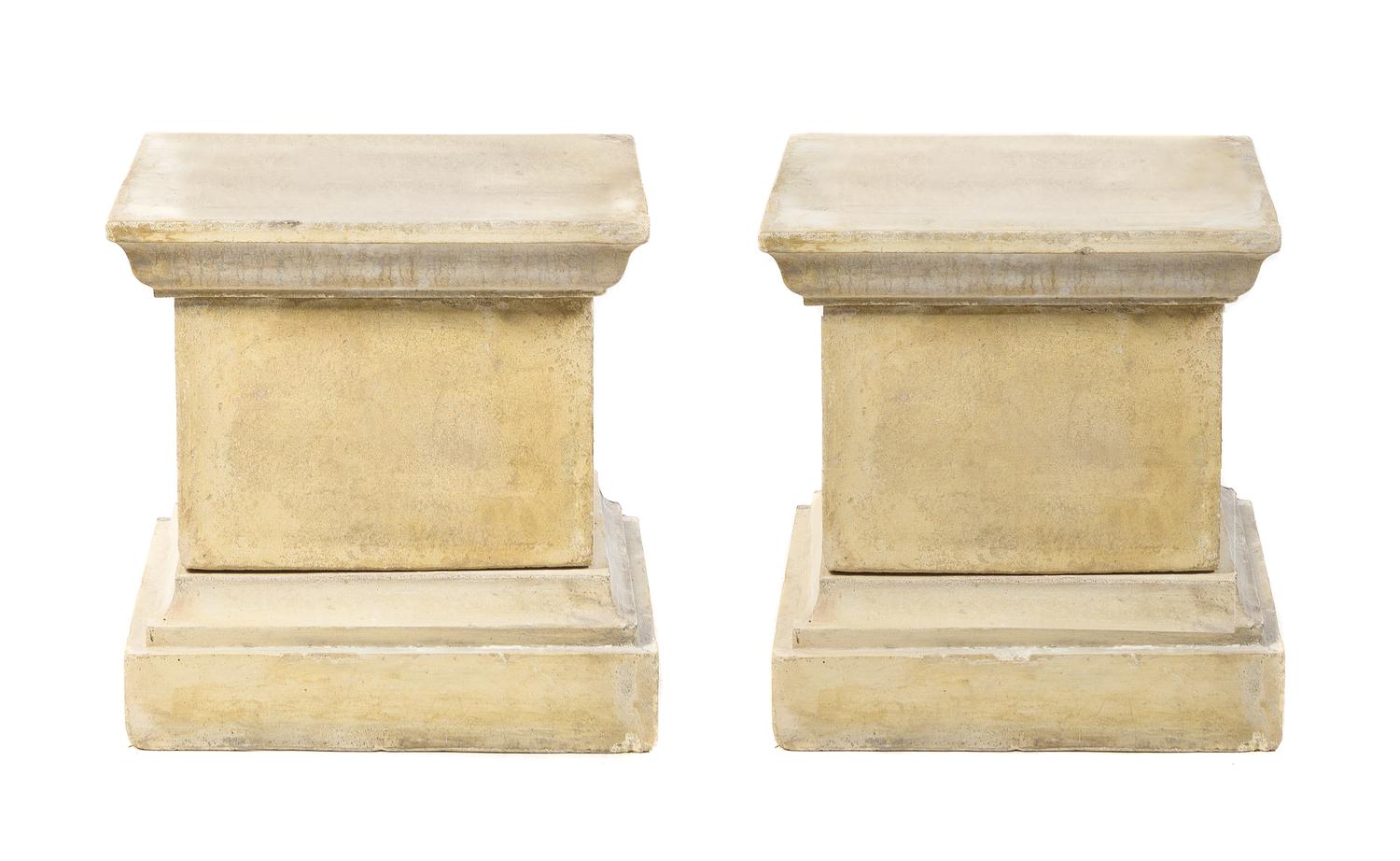A Pair of Cast Stone Pedestals Height 20 inches.