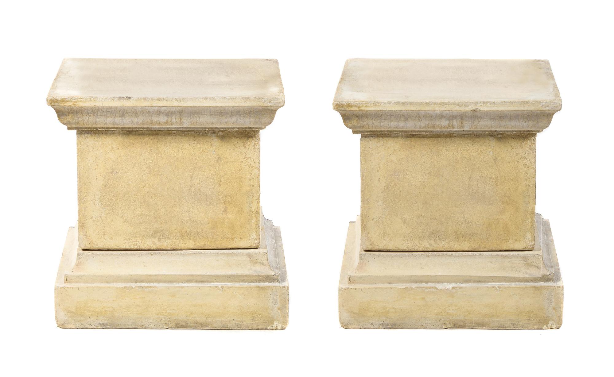 A Pair of Cast Stone Pedestals Height 20 inches.