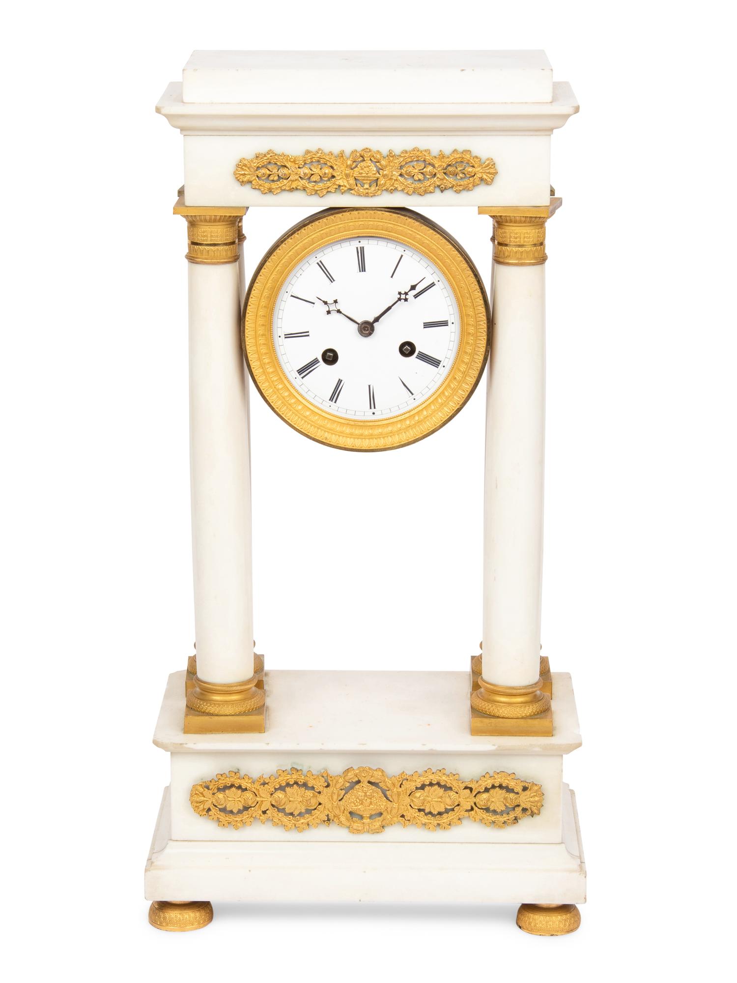 A Napoleon III Marble and Gilt Bronze Mounted Portico Clock