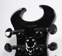 A Schecter Diamond Series Mother-of-Pearl Inlaid Devil Electric Guitar