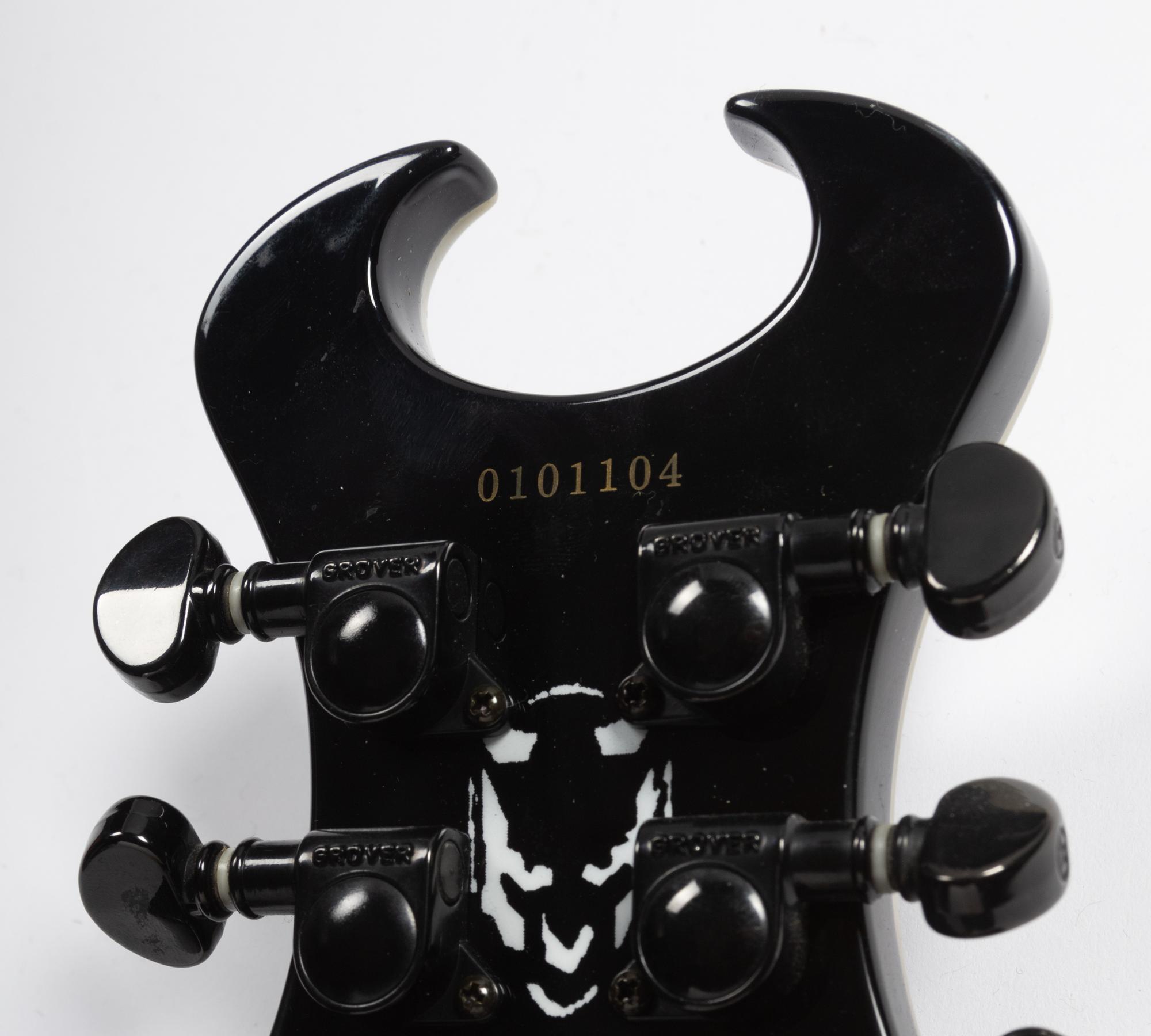 A Schecter Diamond Series Mother-of-Pearl Inlaid Devil Electric Guitar