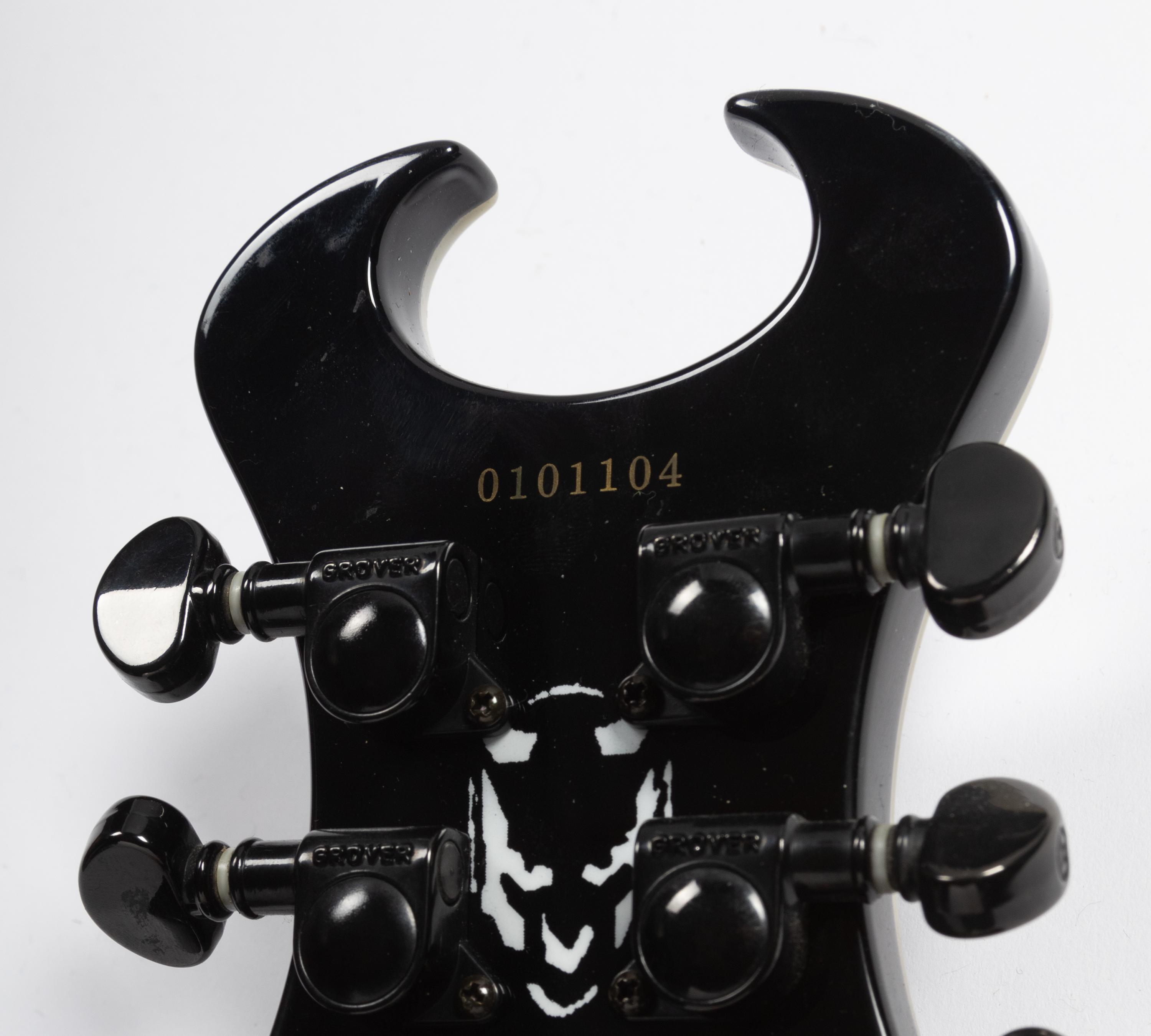 A Schecter Diamond Series Mother-of-Pearl Inlaid Devil Electric Guitar