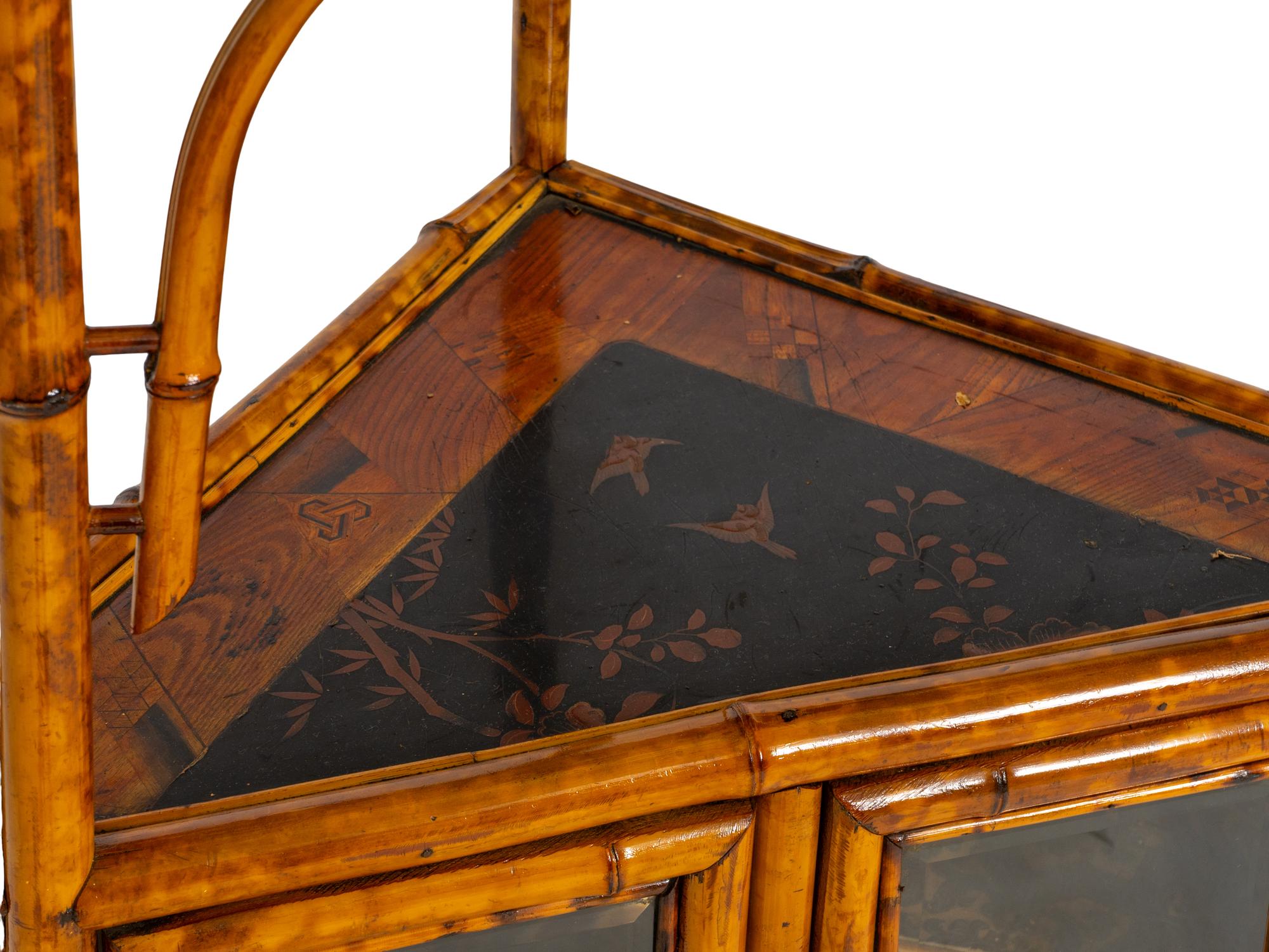 An Edwardian Chinoiserie Decorated Bamboo Corner Cabinet