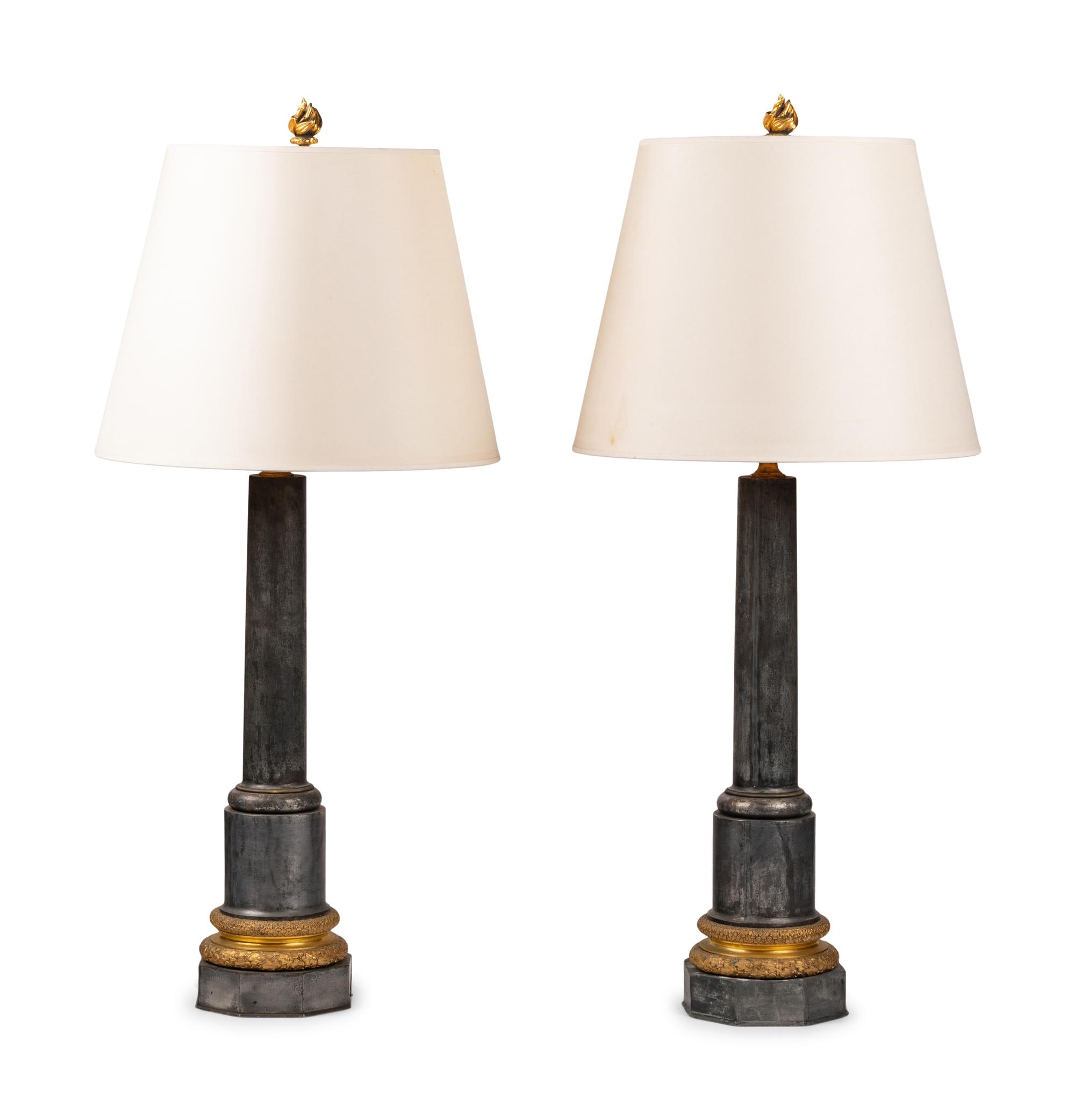 A Pair of French Gilt Bronze and Steel Columnar Lamps