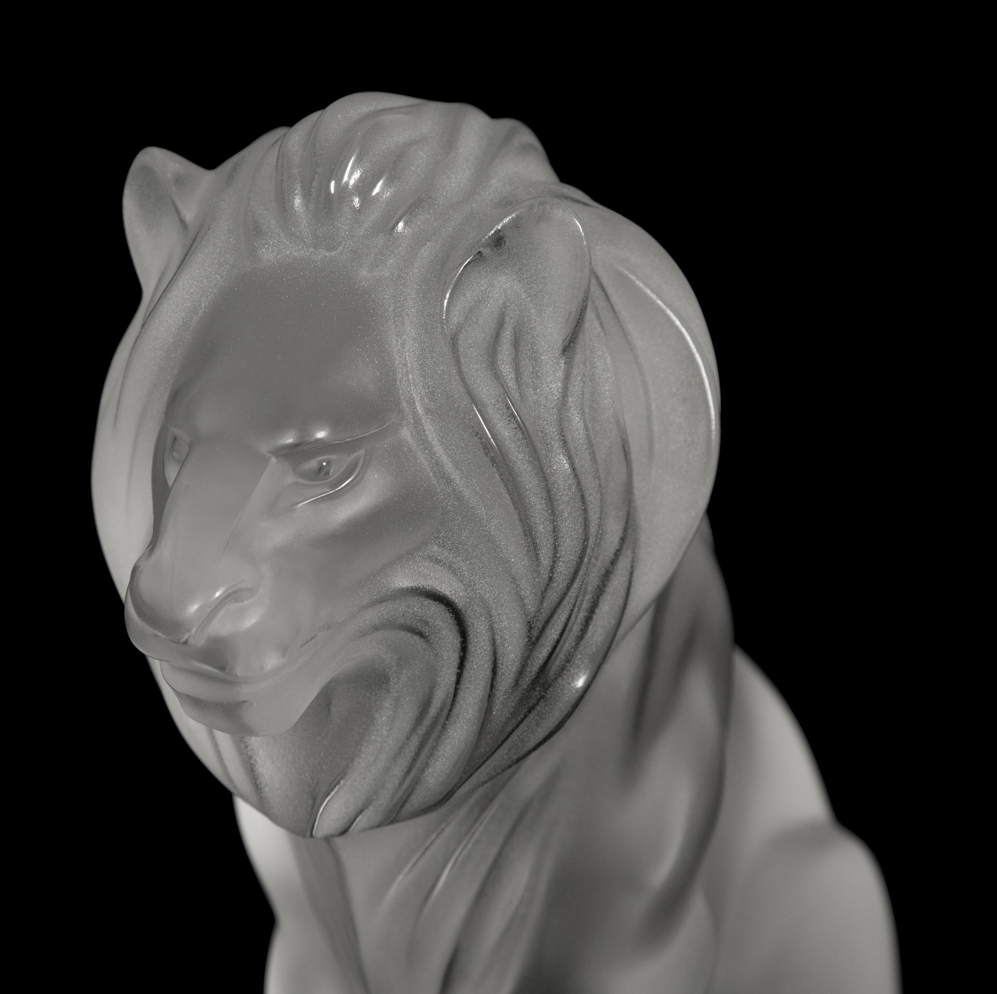 A Lalique Lion and a Lalique Lioness