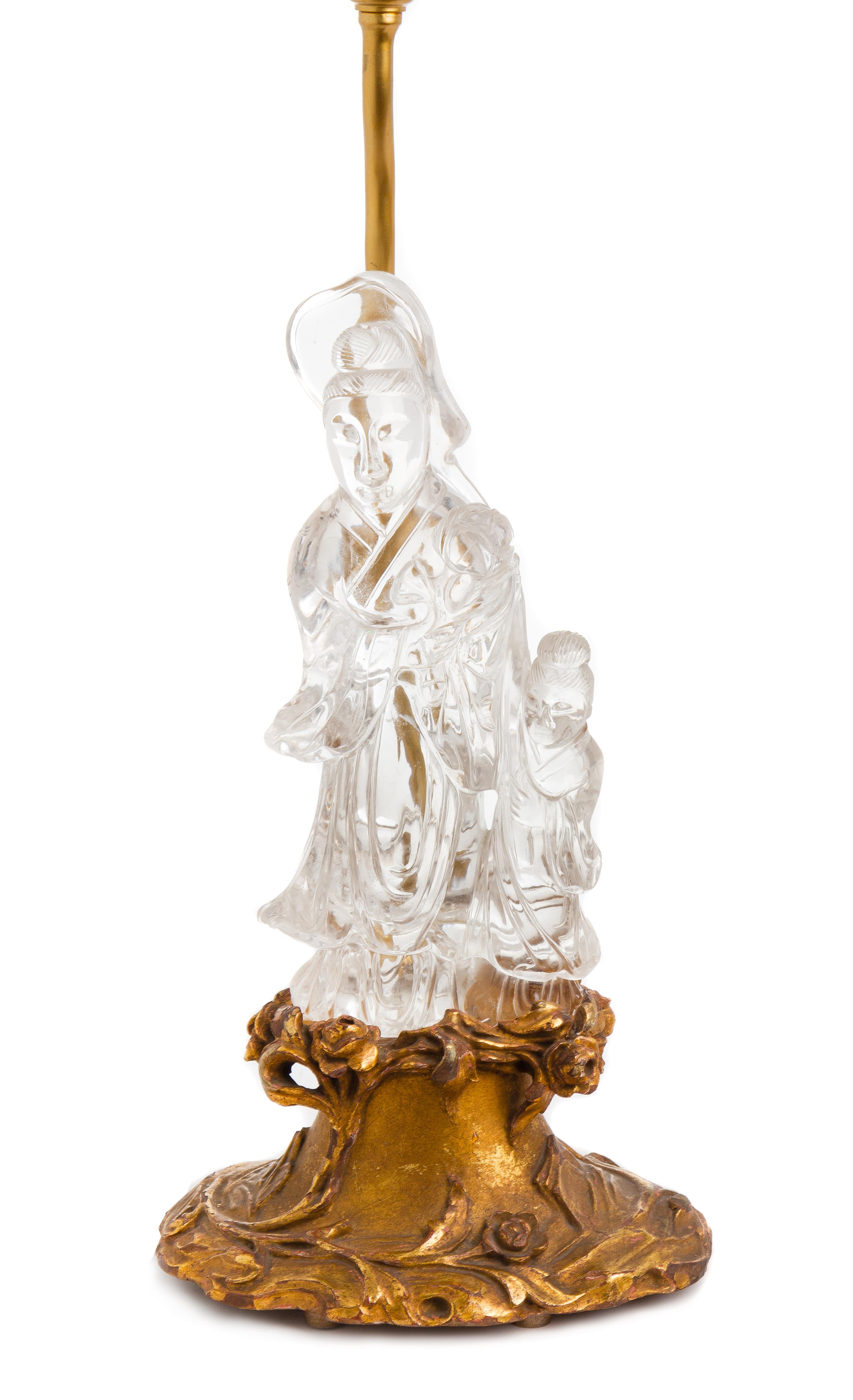A Chinese Carved Rock Crystal Figural Group Height of figure 9 inches. — 20TH CENTURY