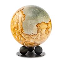 A Petrified Wood Spherical Ornament