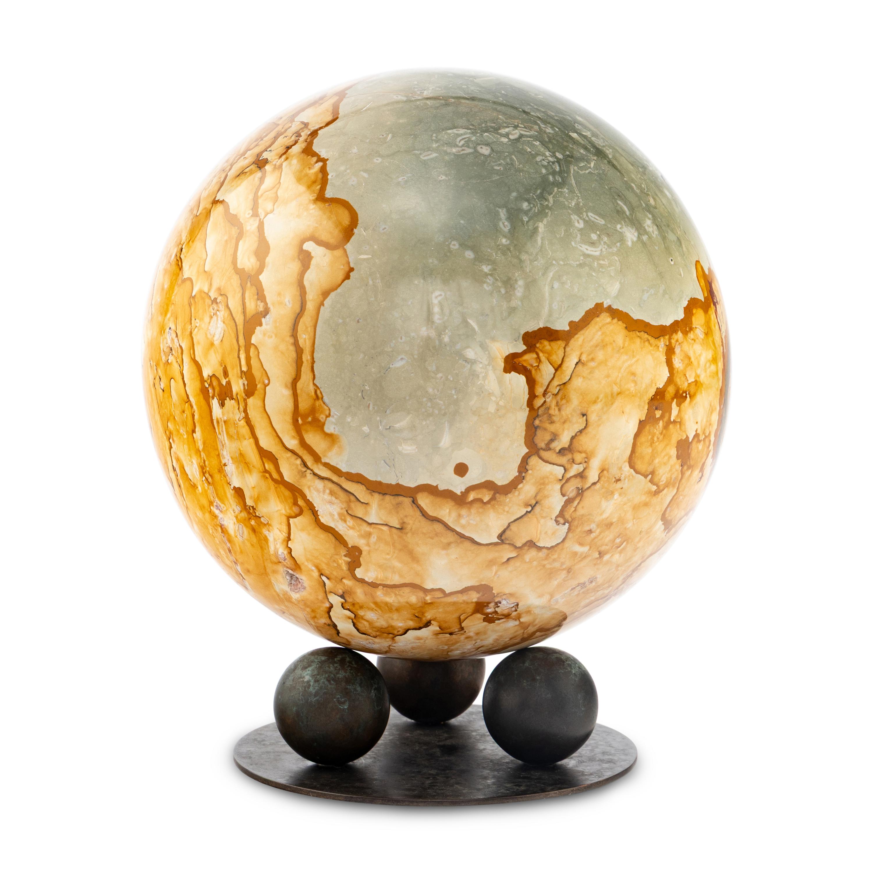 A Petrified Wood Spherical Ornament