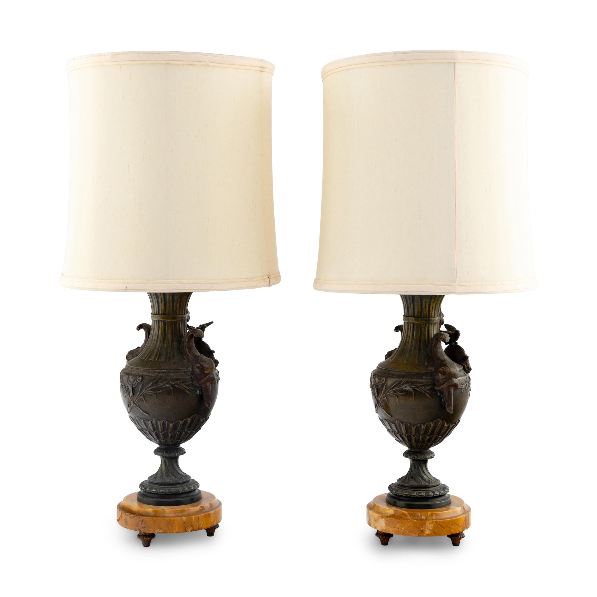 A Pair of French Cast Metal and Marble Lamps