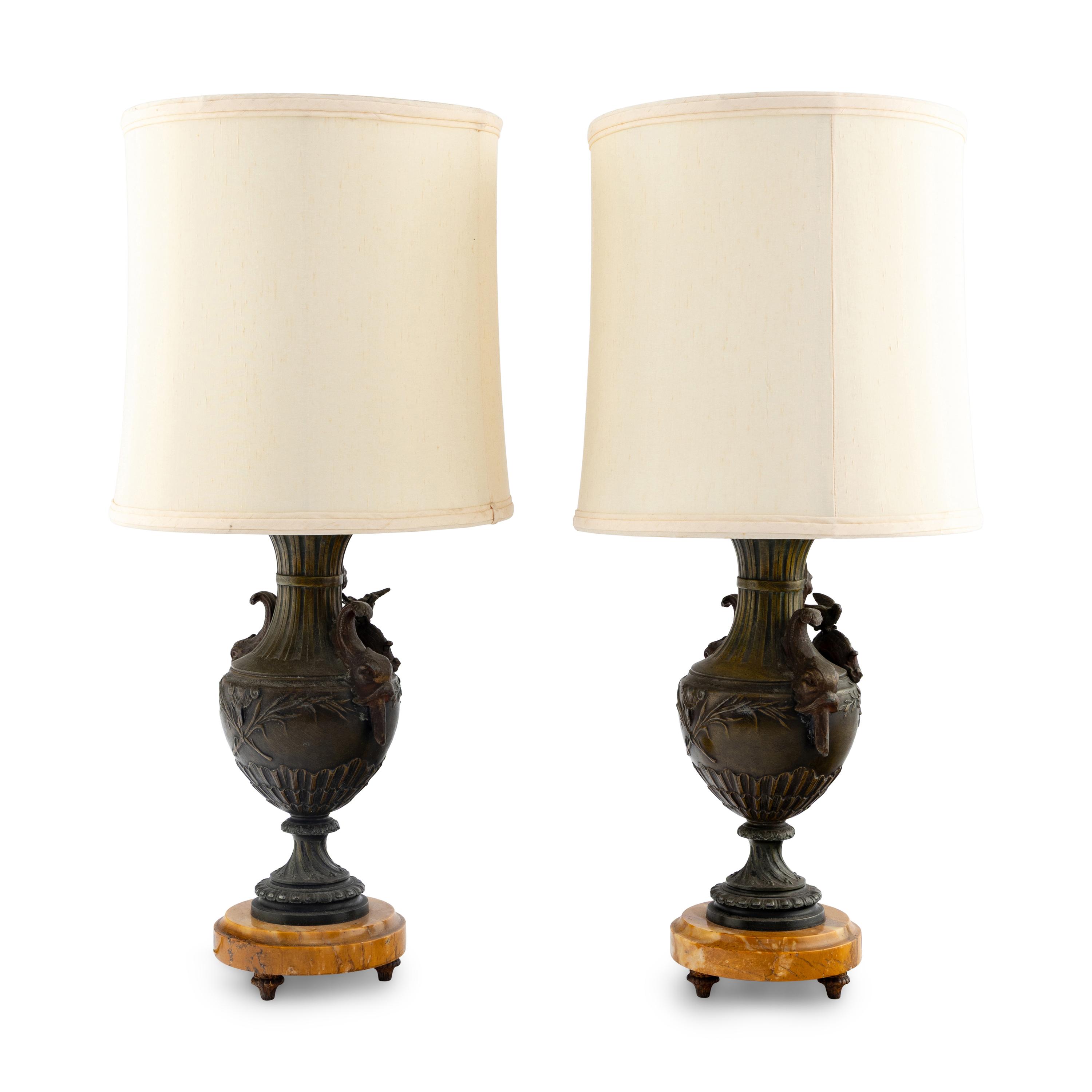 A Pair of French Cast Metal and Marble Lamps