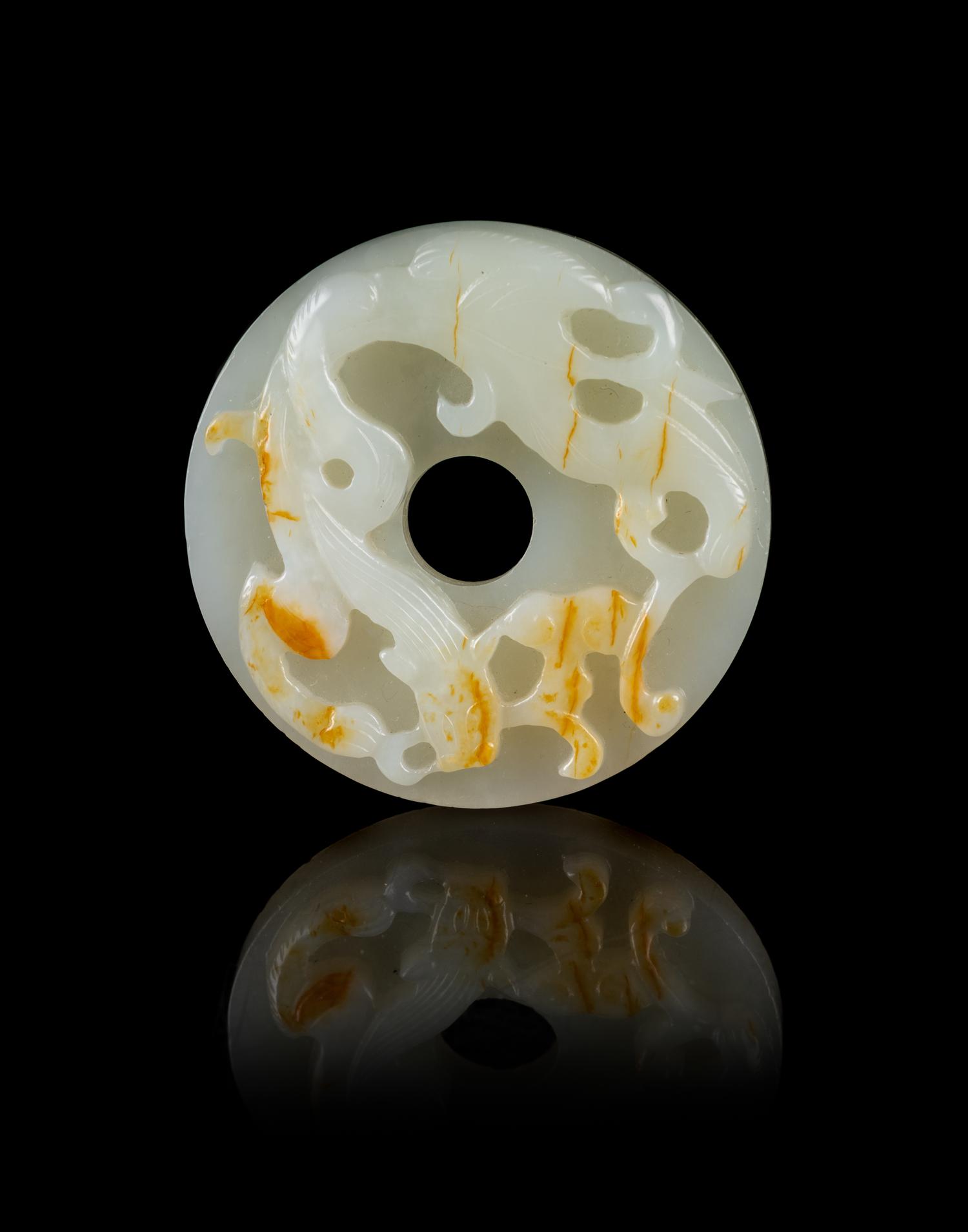 A Chinese White Jade Reticulated Bi Pendant