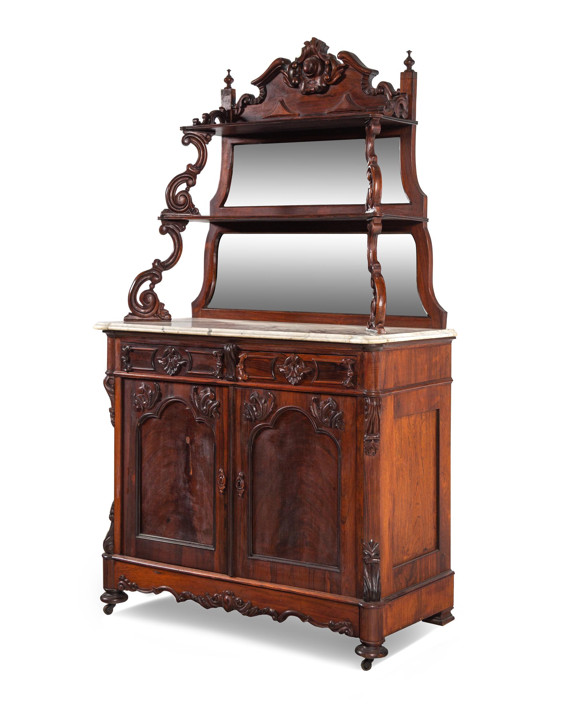 A Rococo Revival Carved Rosewood Marble-Top Serving Cabinet