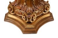 A Pair of Italian Carved and Parcel Gilt Column Capitals