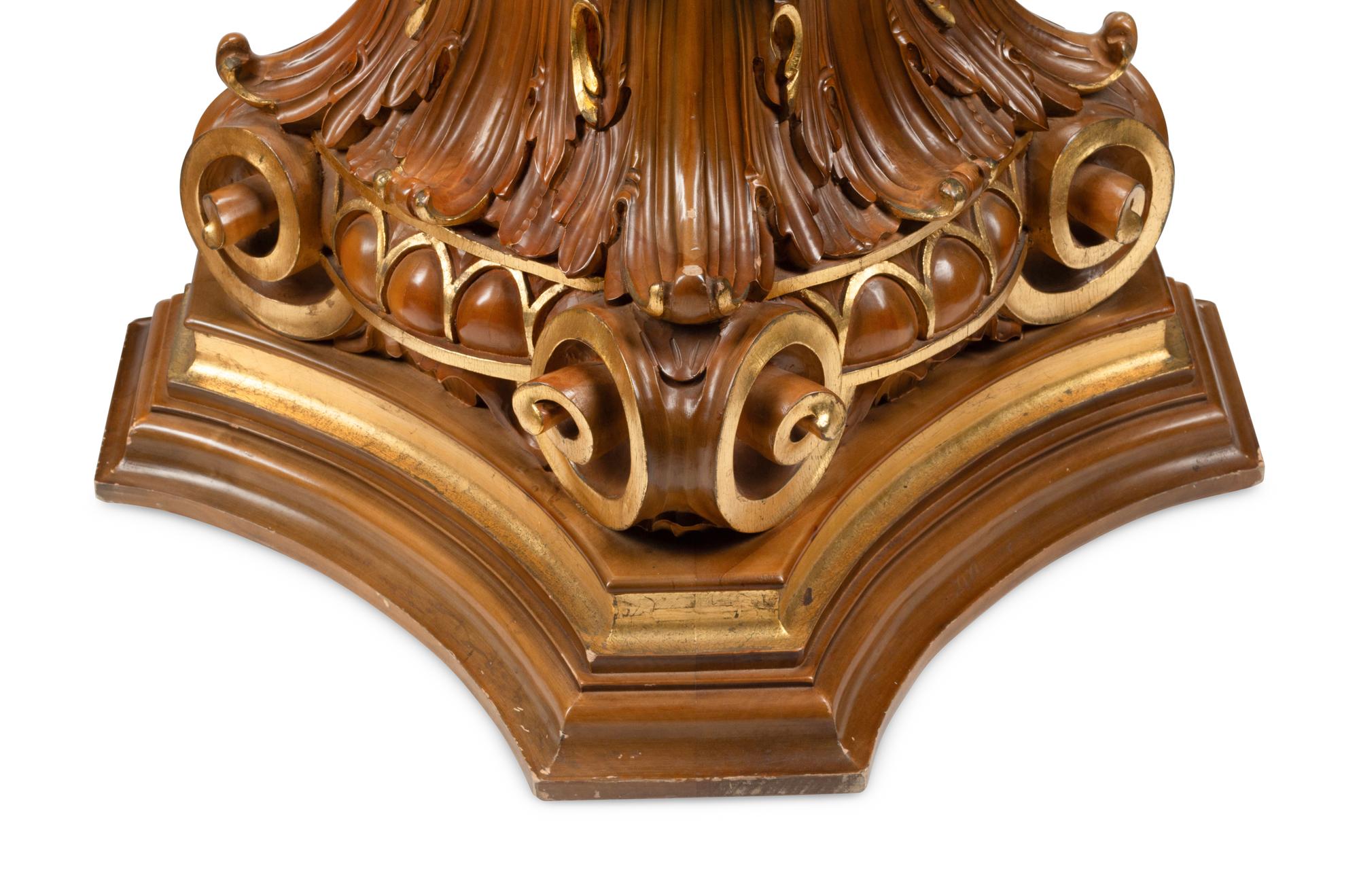 A Pair of Italian Carved and Parcel Gilt Column Capitals