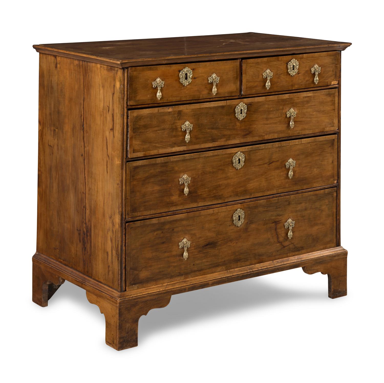 A George II Walnut and Mahogany Chest of Drawers