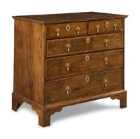 A George II Walnut and Mahogany Chest of Drawers