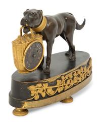 A Small French Gilt and Patinated Bronze Dog Clock
