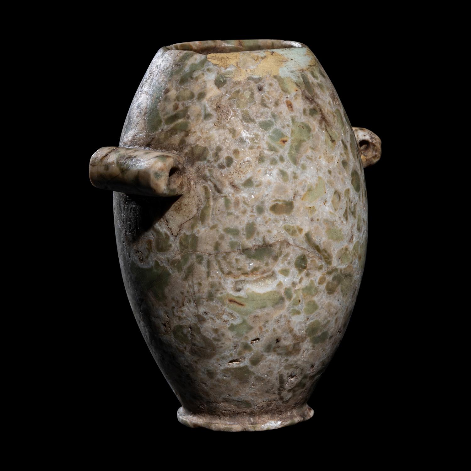 An Egyptian Green Gray Breccia Vessel with Lug Handles
