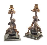 A Pair of Continental Gilt and Patinated Bronze and Marble Figural Candlesticks