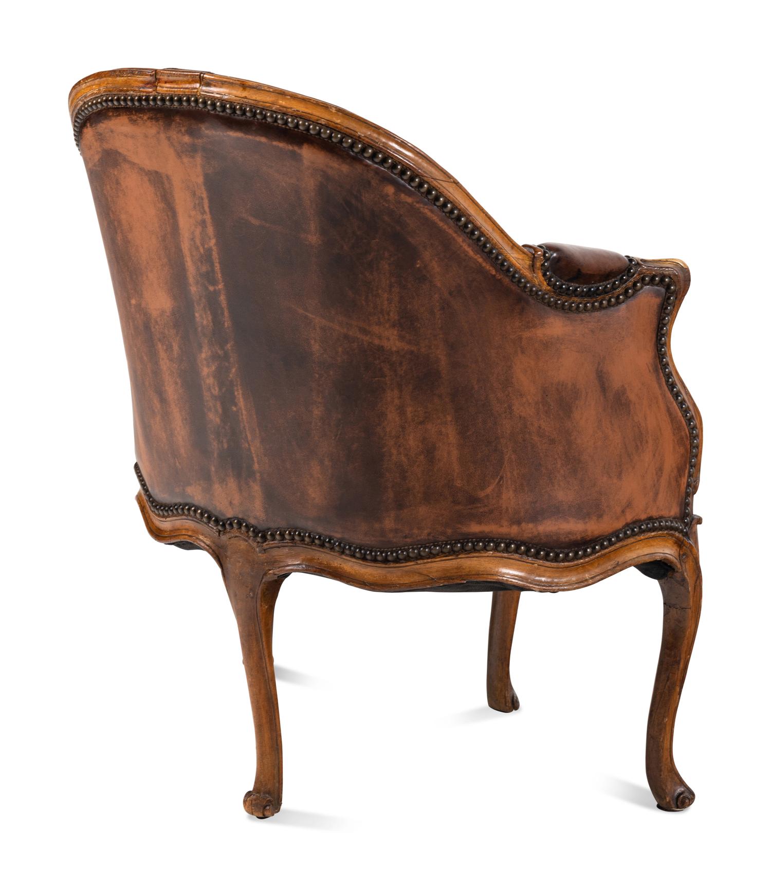 A Louis XV Leather Upholstered Bergère