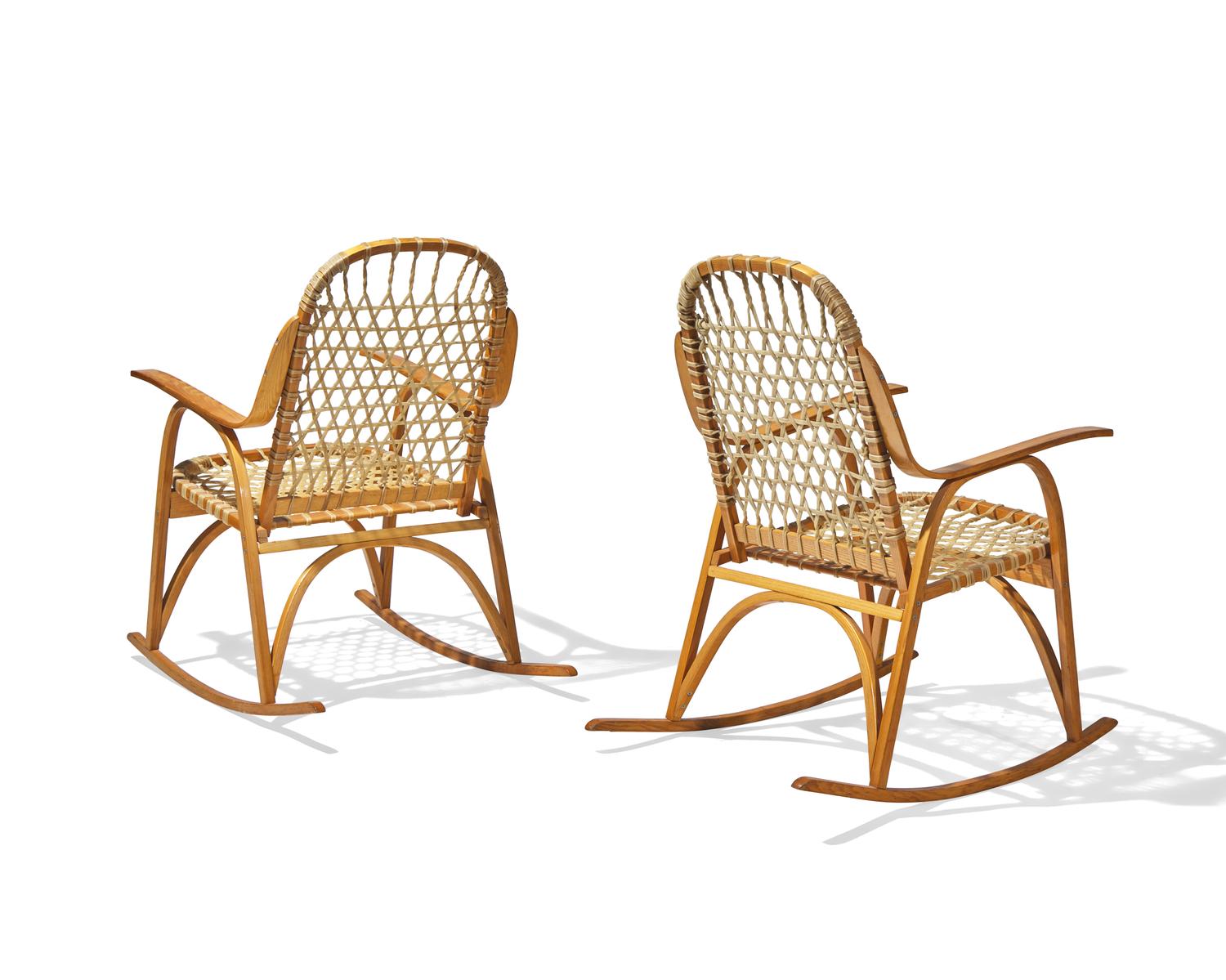 A Pair of Lacquered Fruitwood and Rawhide 'Snowshoe' Rocking Chairs
