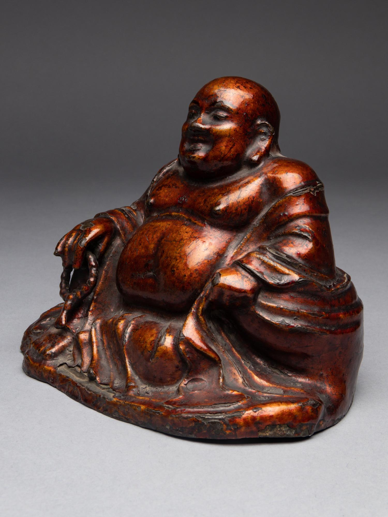 A Lacquered Bronze Figure of Budai Buddha