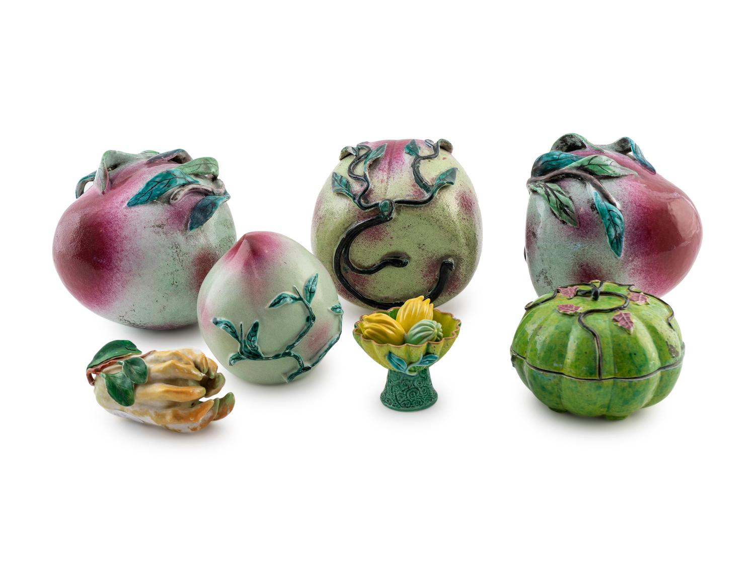 A Group of Four Chinese Ceramic Plums — 19TH CENTURY