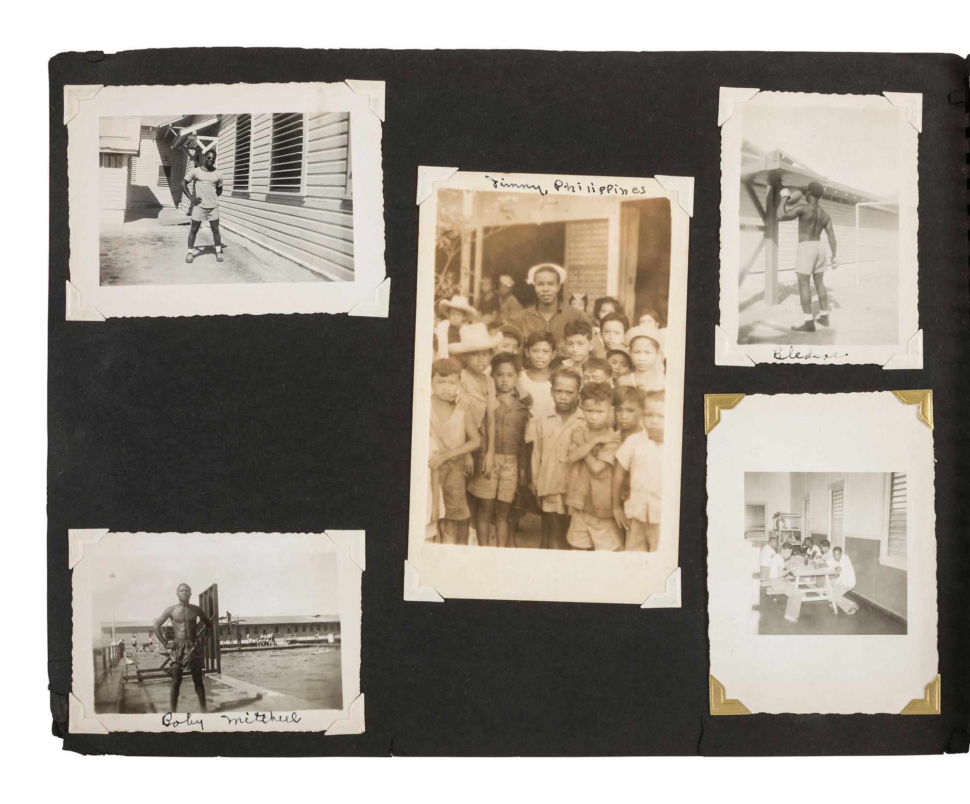 [KOREAN WAR]. Photograph album featuring African American sailors during the Korean War.