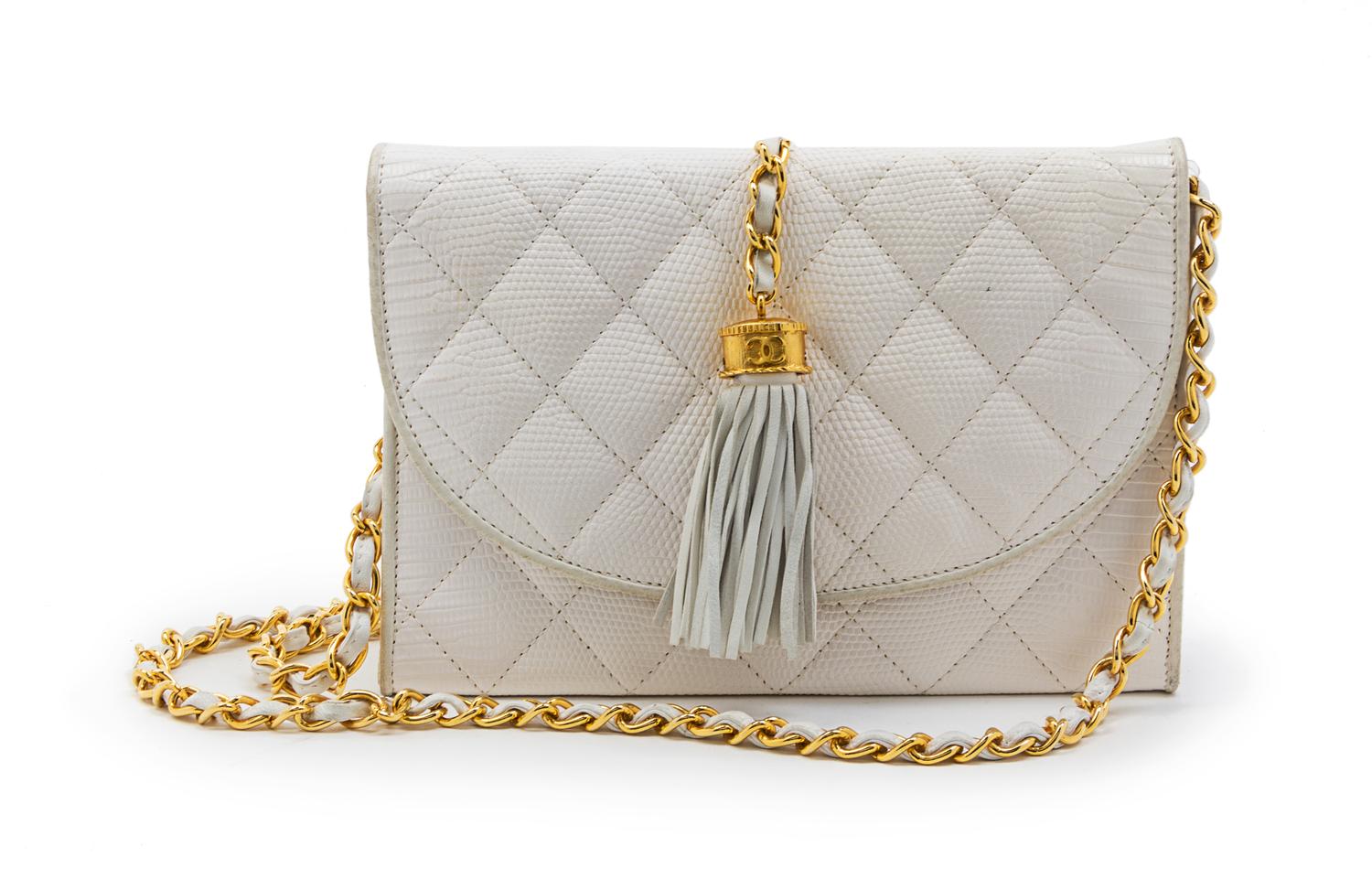 A Chanel White Quilted Lizardskin Bag, 8 x 5 1/2 x 2 1/2 inches.