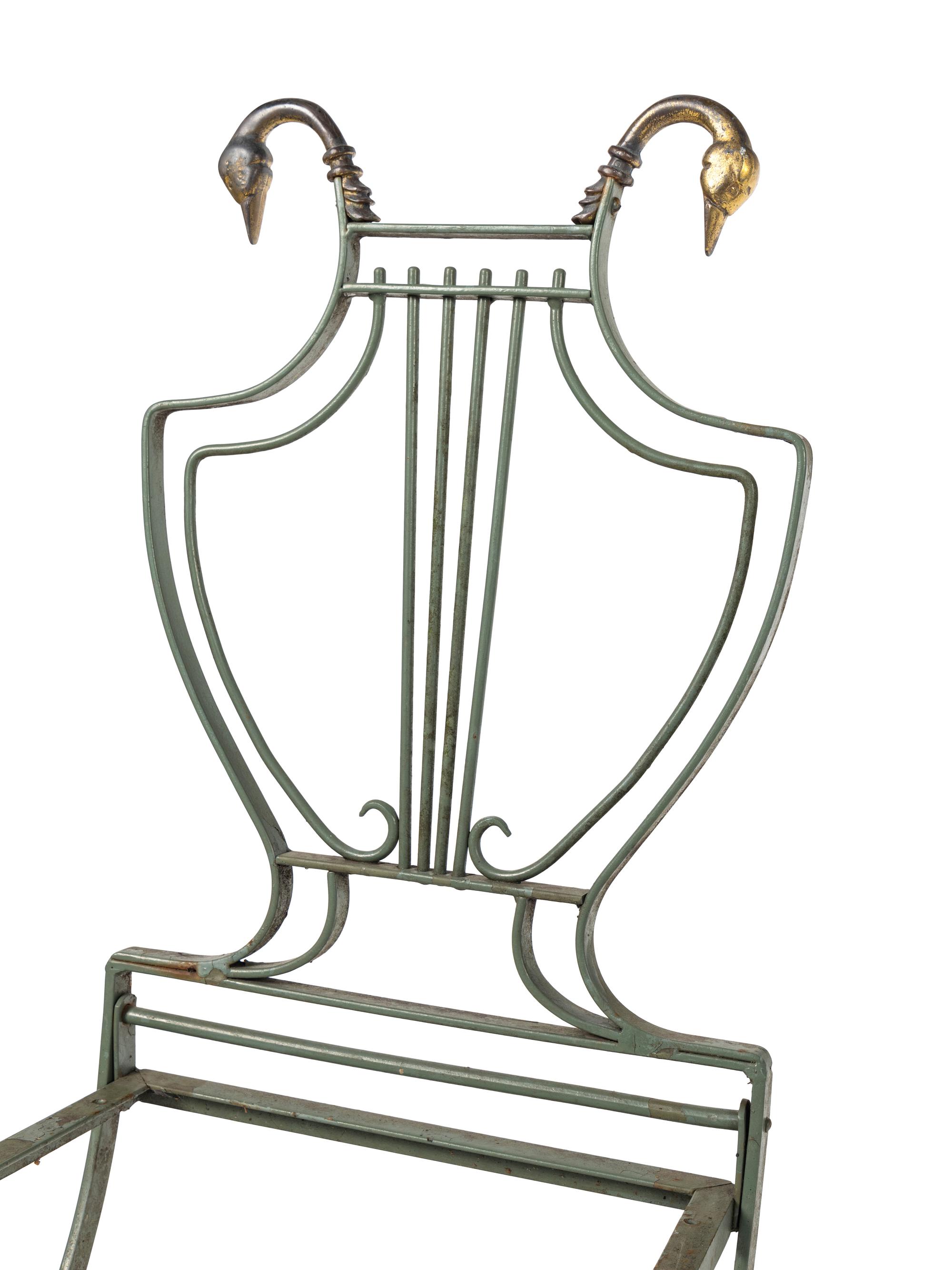 A Set of Four Painted Metal Folding Garden Chairs