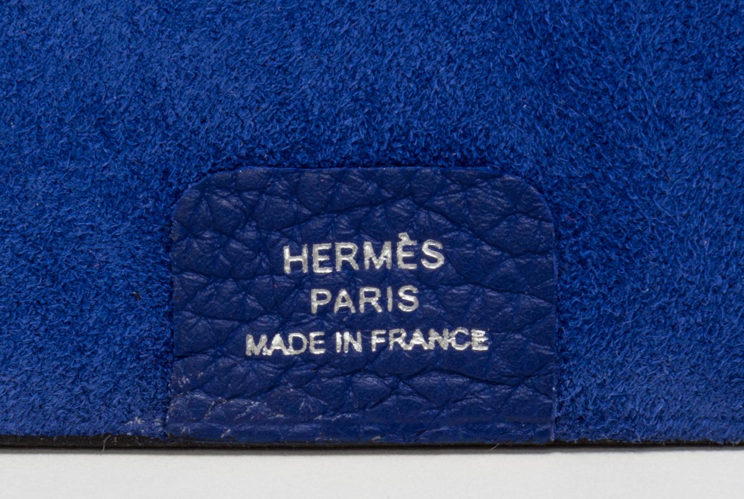 An Hermes Bleu Electrique Togo Ulysse MM Notebook Cover, 9" x 7.5".