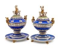 A Pair of German Porcelain Tureens, Covers and Stands