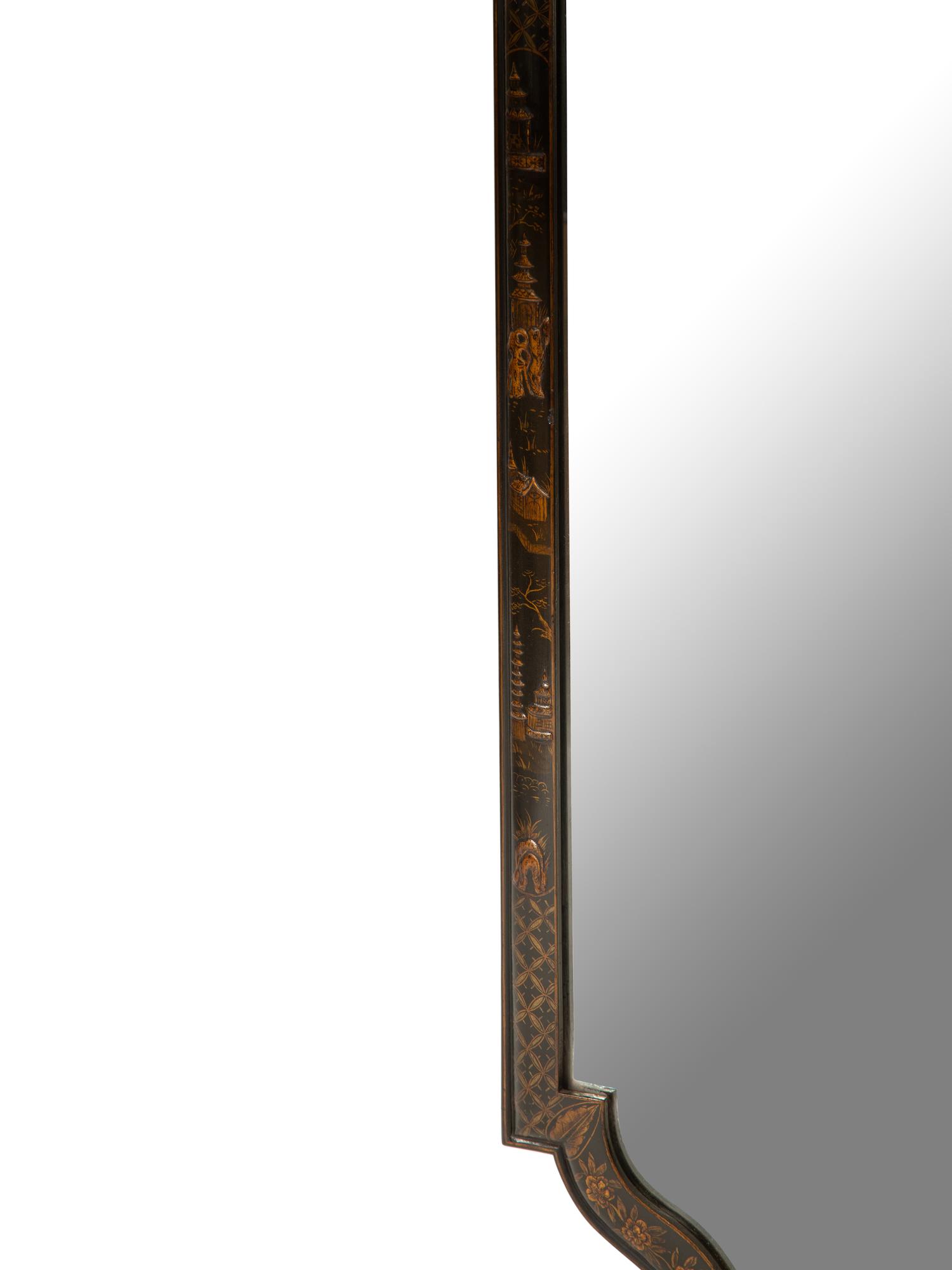 A Regency Style Black Lacquer Chinoiserie Framed Mirror with Reverse Painted Panel