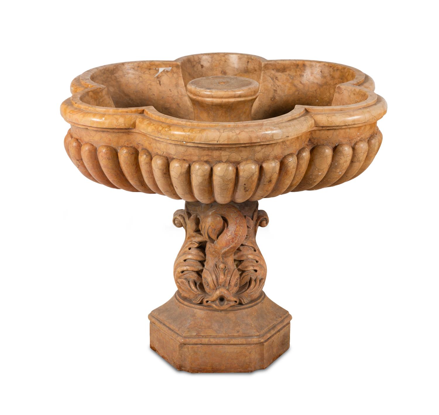 A Large Carved Sienna Marble Fountain