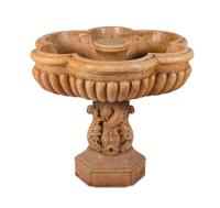 A Large Carved Sienna Marble Fountain