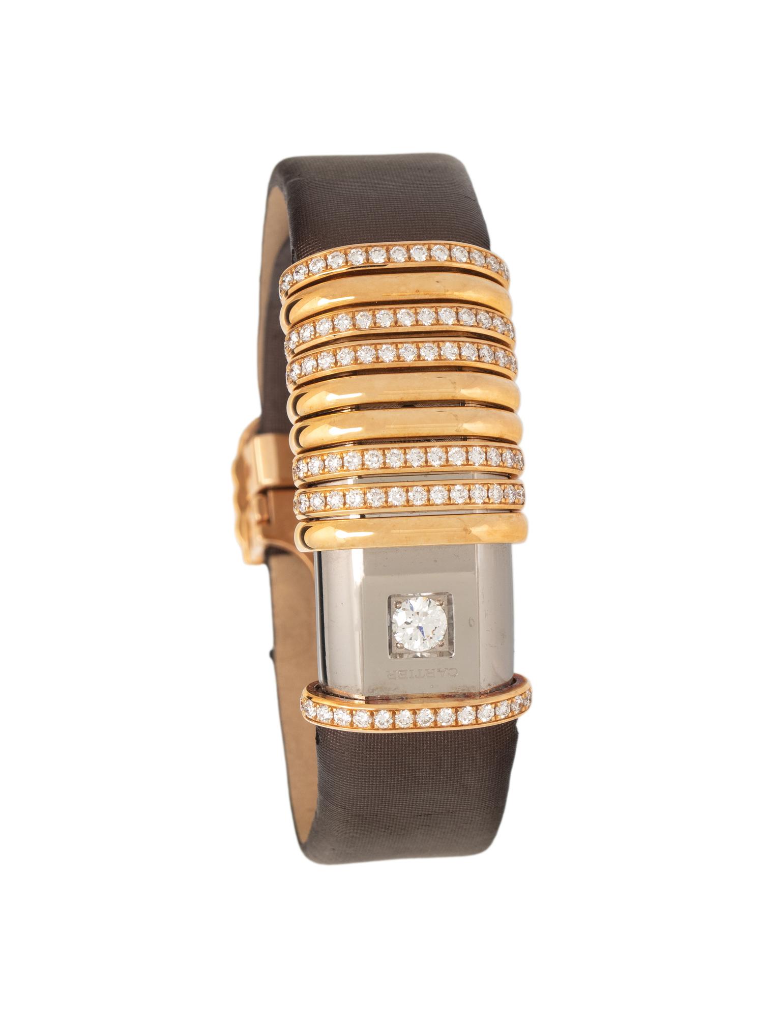 CARTIER, 18K YELLOW GOLD, TITANIUM AND DIAMOND 'DECLARATION' WATCH