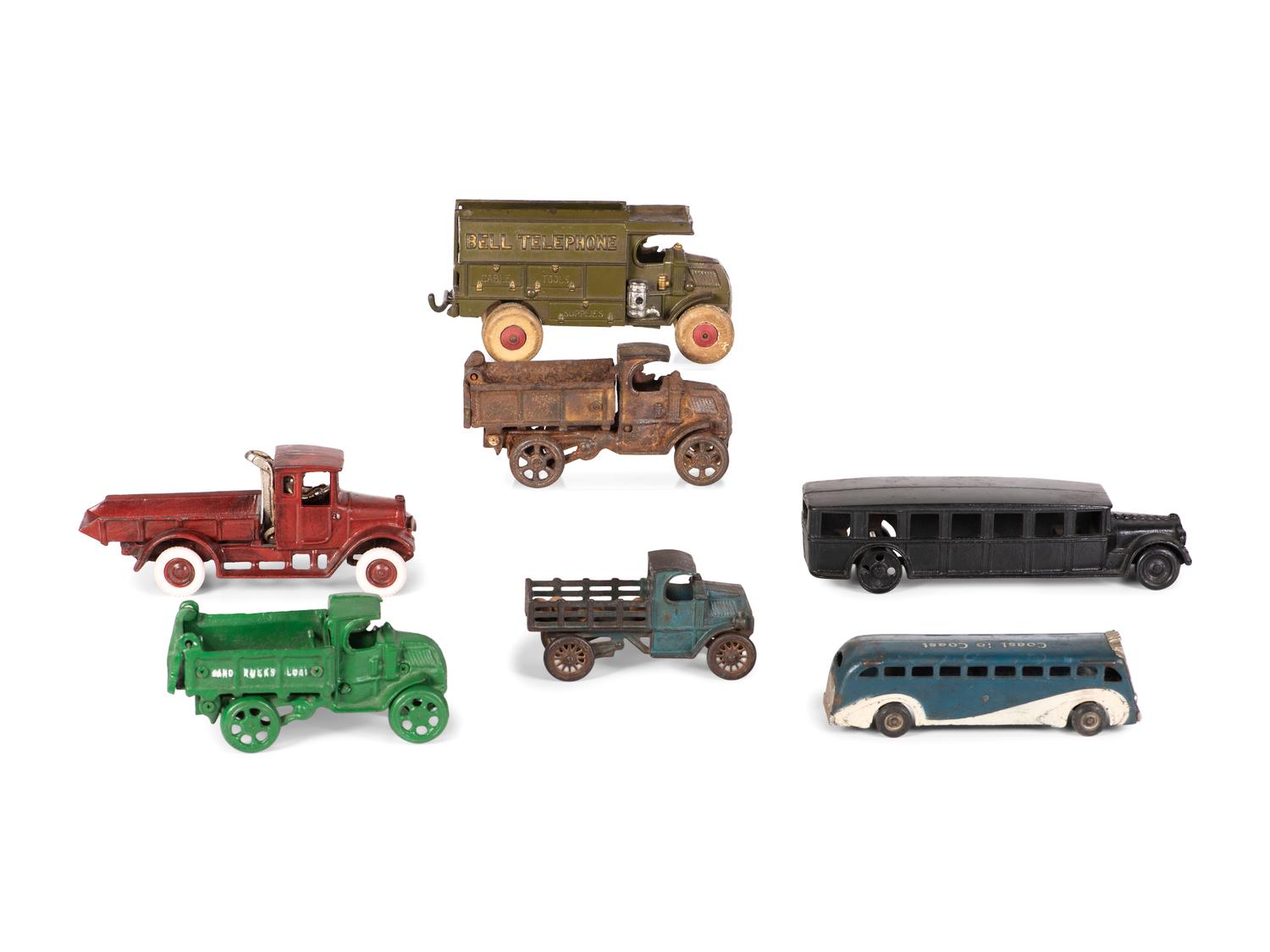 Seven Painted Cast Iron Toy Vehicles