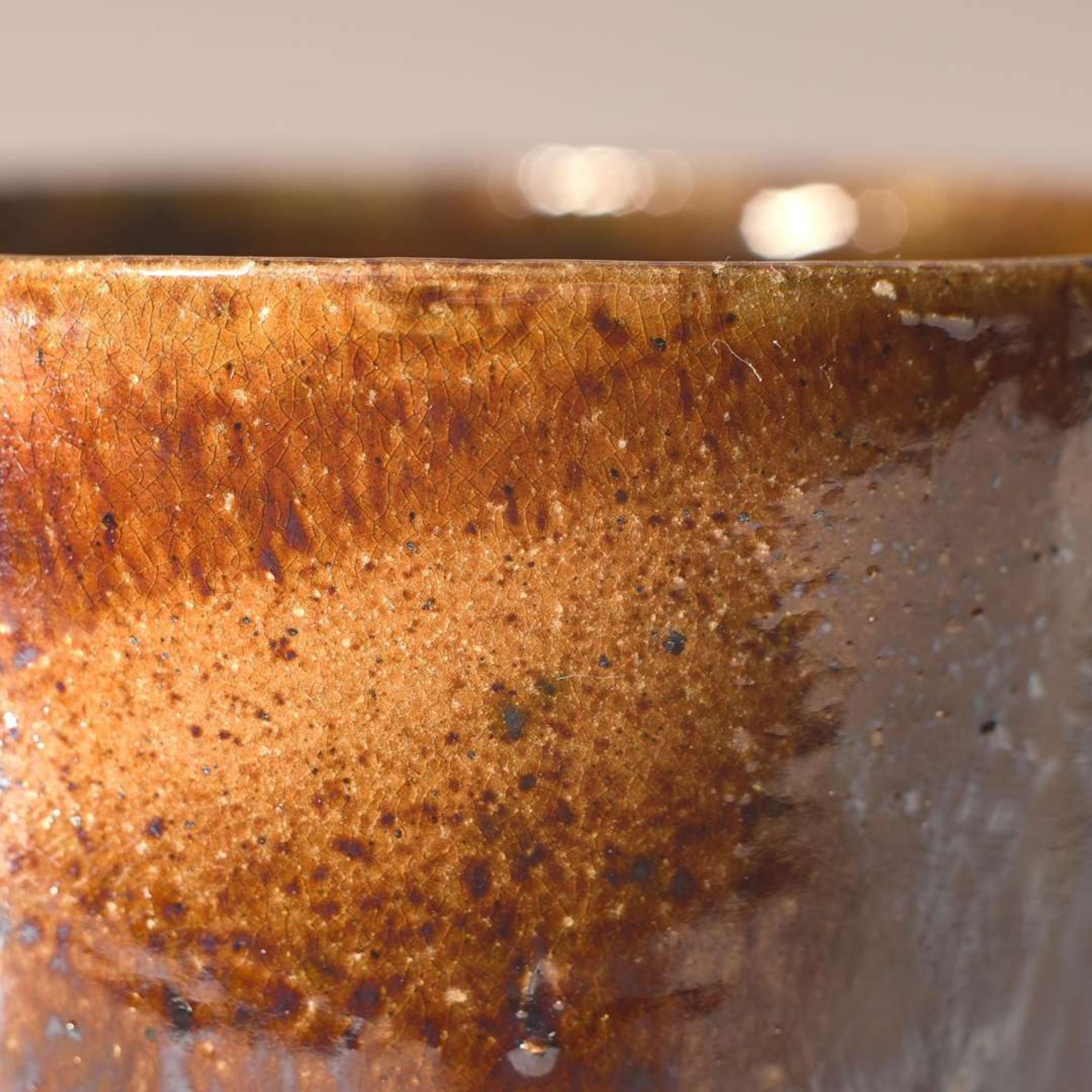 George Ohr (American, 1857-1918) Mug with Snake in Mirrored Speckled Brown with Speckled Olive Interior, Biloxi, Mississippi, USA, circa 1898-1910