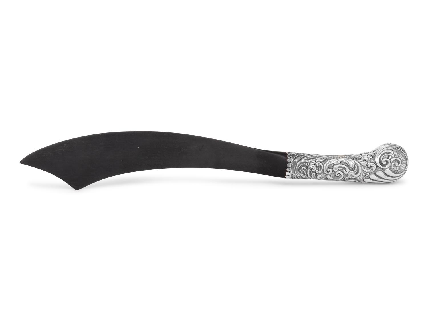 A Victorian Silver and Ebony Scimitar-Form Page Turner