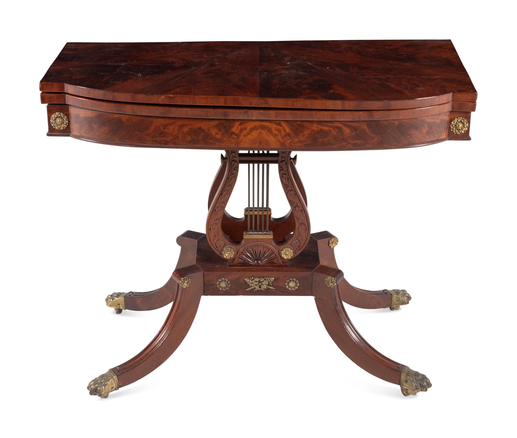 A Classical Gilt Metal Mounted Mahogany Flip-Top Table
